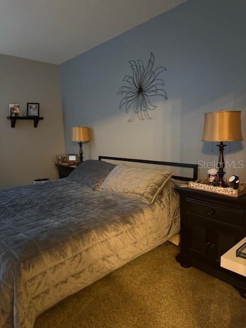 bedroom featuring carpet flooring