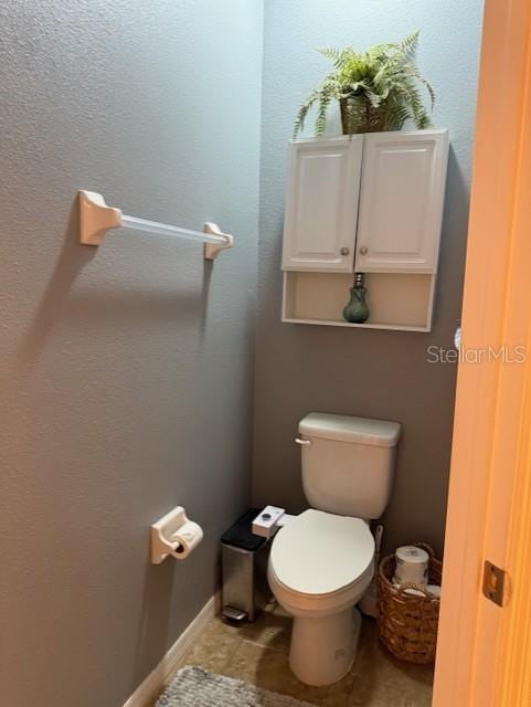 bathroom featuring toilet