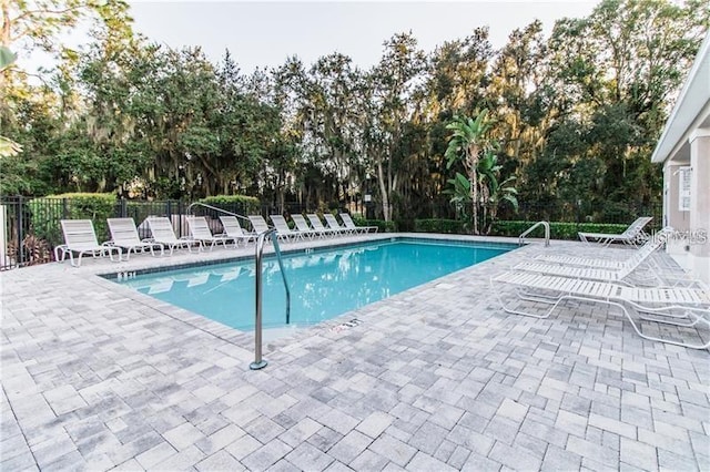 view of pool featuring a patio area