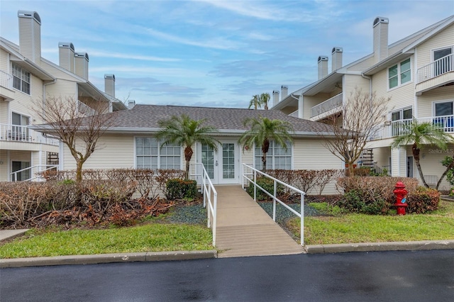 exterior space with a front yard