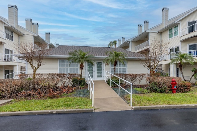 exterior space featuring a front lawn