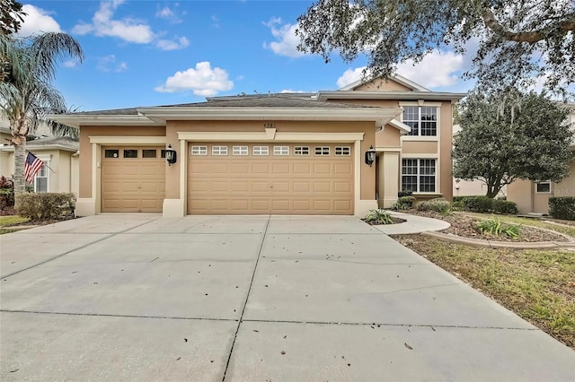 view of front of home with a garage