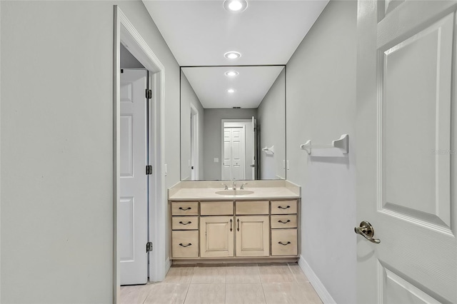 bathroom with vanity and tile patterned flooring