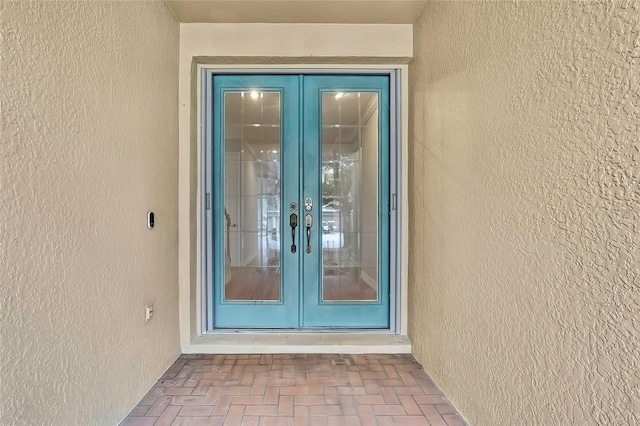 doorway to property with french doors