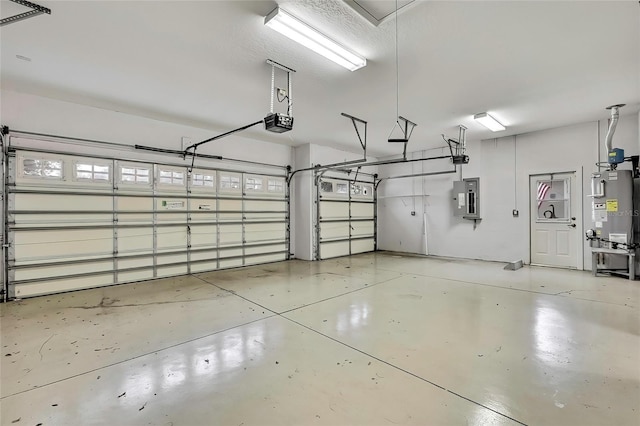 garage with a garage door opener, electric panel, and electric water heater