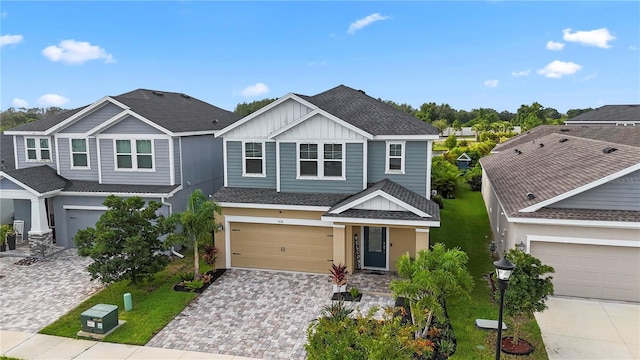 craftsman inspired home featuring a garage