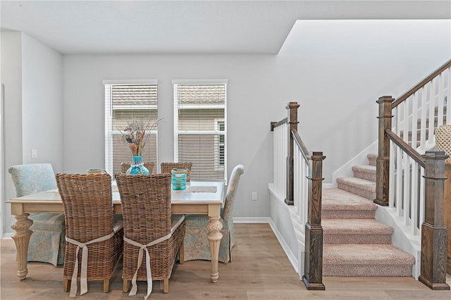 dining space featuring light hardwood / wood-style flooring