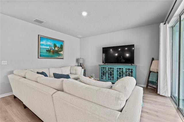 living room featuring light hardwood / wood-style floors