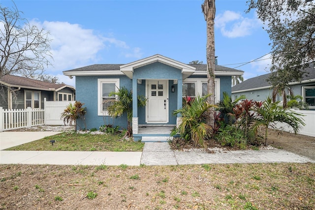 bungalow with a front lawn