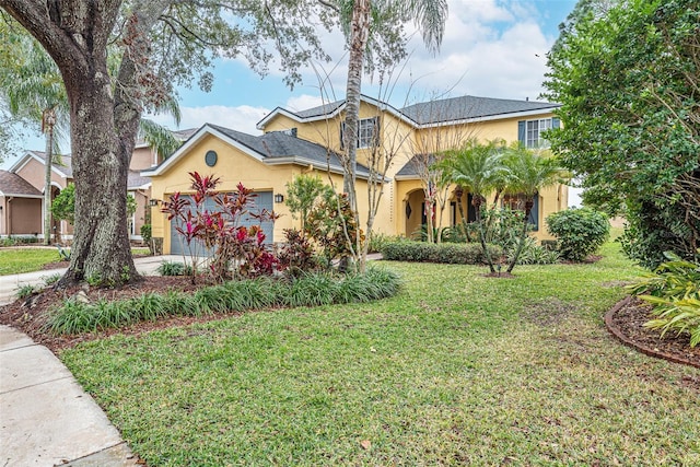 view of front facade with a front yard