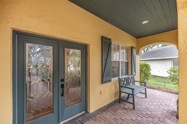 doorway to property featuring french doors