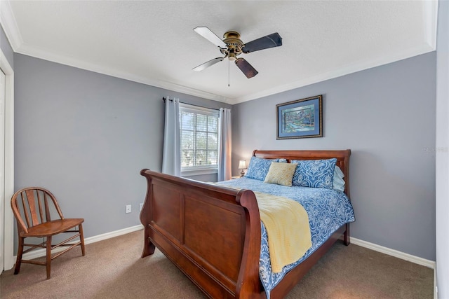 bedroom featuring crown molding, carpet flooring, and ceiling fan