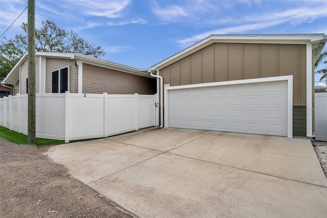 exterior space with a garage