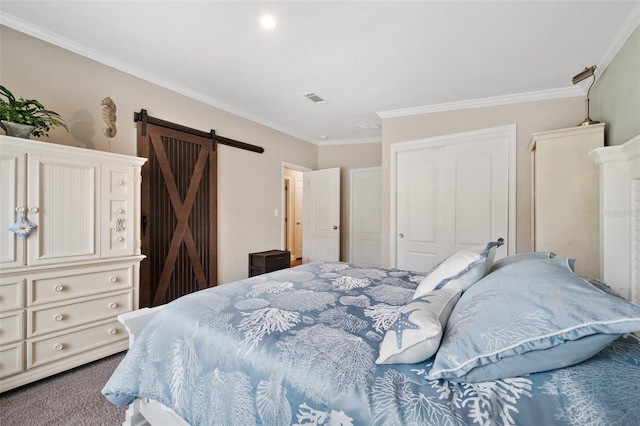 carpeted bedroom with a barn door, a closet, and crown molding