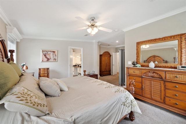 carpeted bedroom featuring ceiling fan, crown molding, and connected bathroom