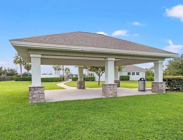 view of property's community featuring a gazebo and a lawn