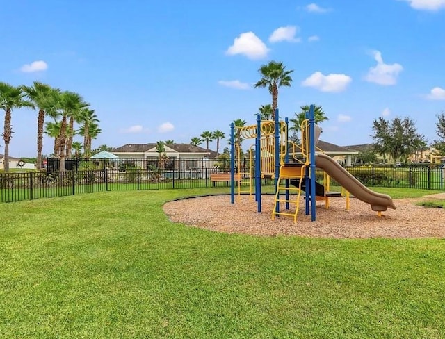 view of playground with a yard