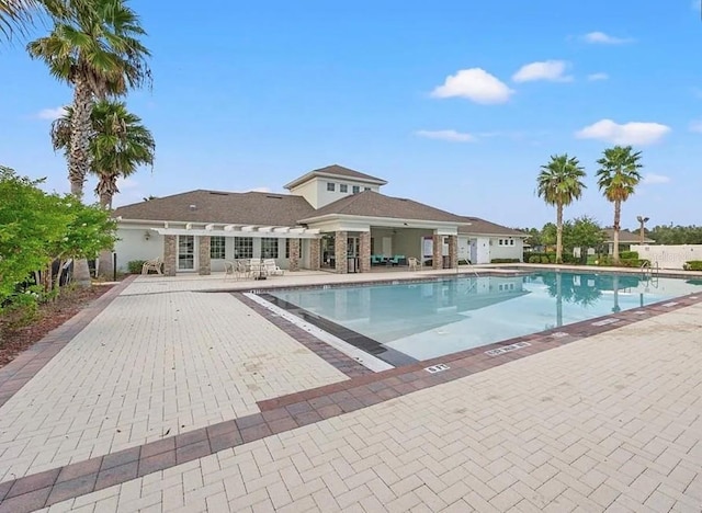 view of pool featuring a patio area