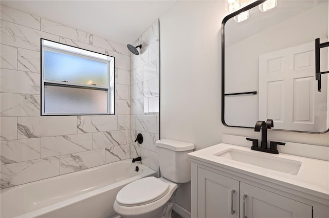 bathroom featuring toilet, vanity, and bathing tub / shower combination