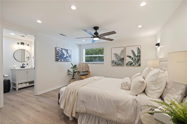 bedroom with recessed lighting, baseboards, visible vents, and light wood finished floors