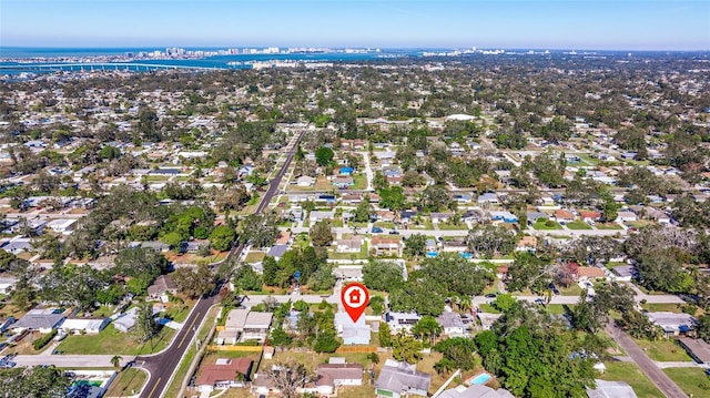 aerial view with a residential view and a water view