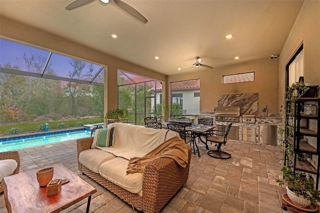 sunroom with ceiling fan