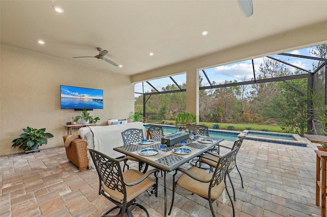 sunroom / solarium with ceiling fan