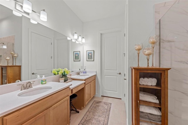 bathroom with vanity and walk in shower