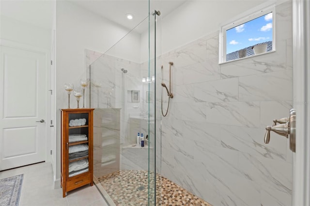 bathroom featuring a tile shower