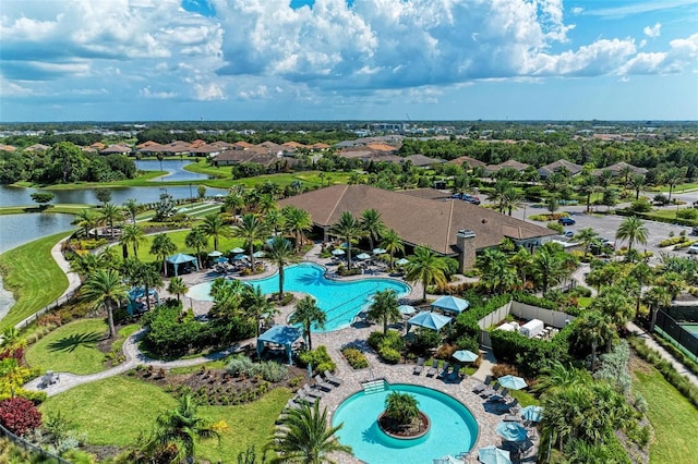 birds eye view of property featuring a water view