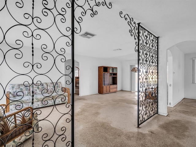 interior space featuring a textured ceiling