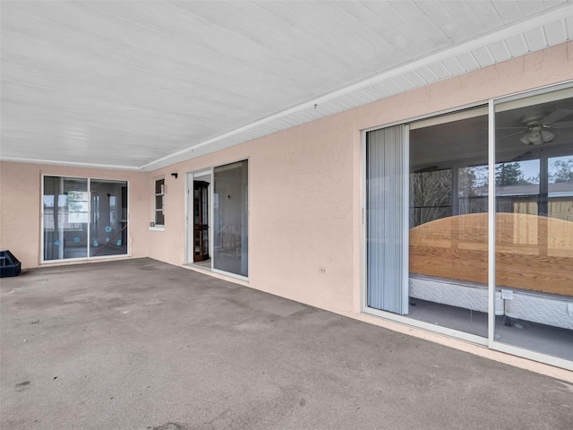 view of patio / terrace featuring ceiling fan