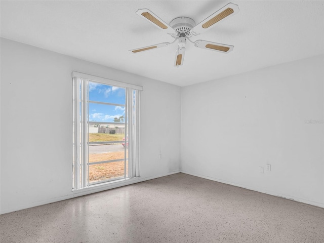 empty room featuring ceiling fan