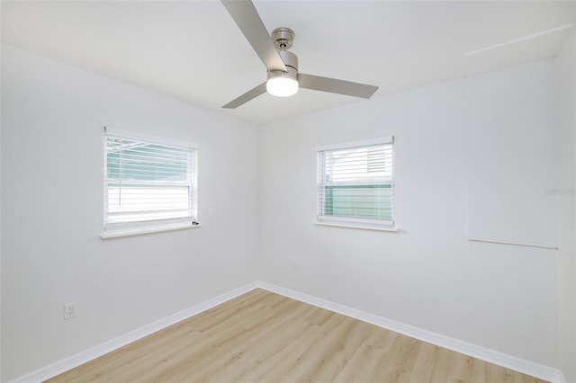 unfurnished room featuring ceiling fan and light hardwood / wood-style flooring