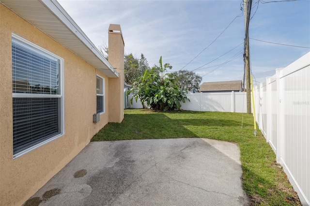 view of yard with a patio area