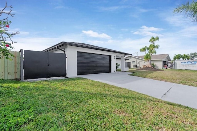 exterior space featuring a garage and a front yard