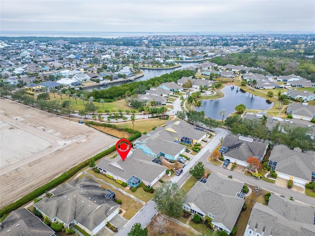 drone / aerial view featuring a water view