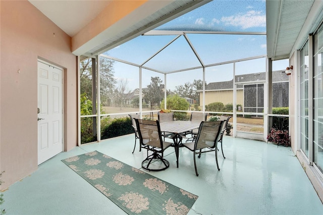 sunroom / solarium featuring a healthy amount of sunlight