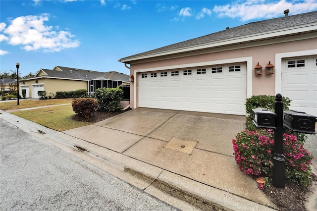 garage with a yard