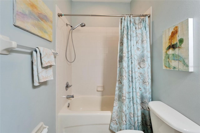 bathroom featuring toilet and shower / bath combo with shower curtain