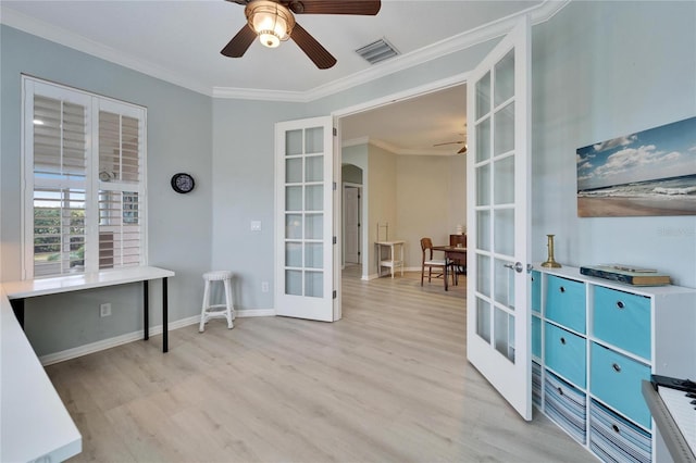 office featuring ceiling fan, ornamental molding, french doors, and light wood-type flooring