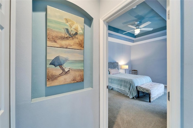 bedroom featuring ceiling fan and carpet floors