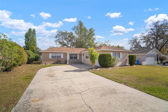 ranch-style house with a garage and a front yard