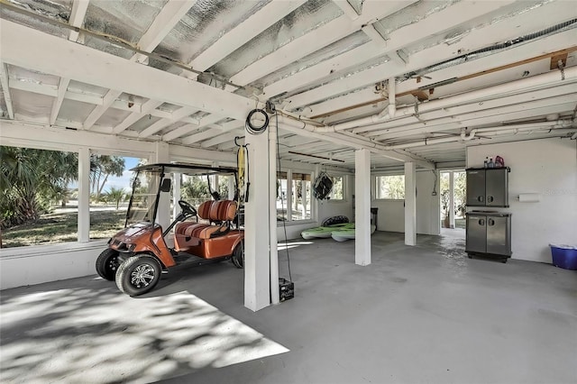 garage featuring a carport