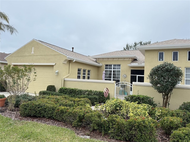 view of front of home featuring a garage