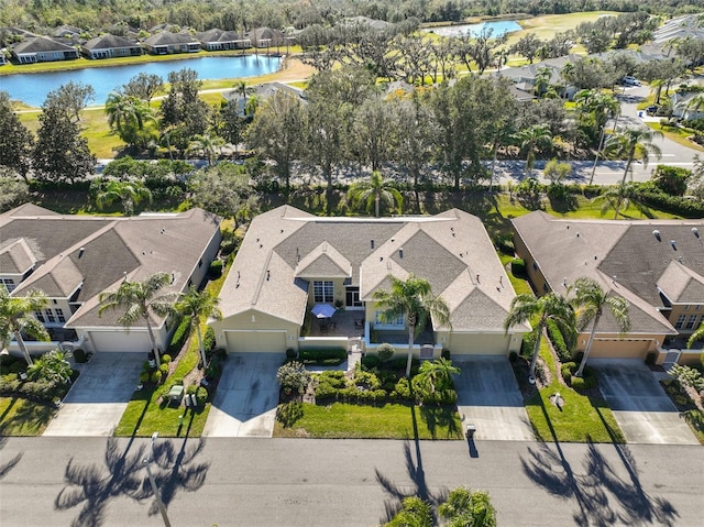 aerial view featuring a water view and a residential view