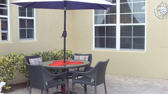 view of patio featuring outdoor dining space