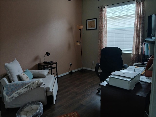 office featuring dark wood-type flooring and baseboards