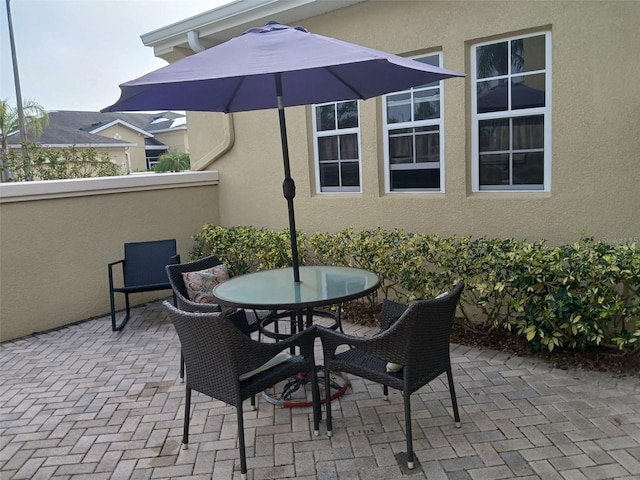 view of patio featuring outdoor dining space