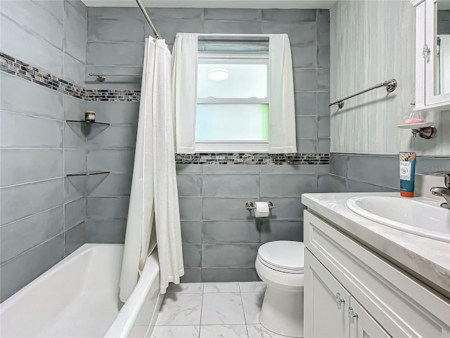 full bathroom featuring vanity, tile walls, toilet, and shower / bathtub combination with curtain